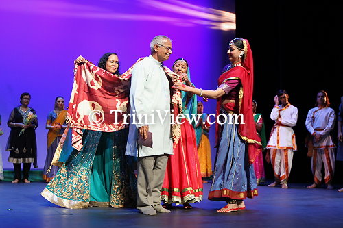 Mr. Vishnu Musai receives the shawl of honour during an Angwastram ceremony