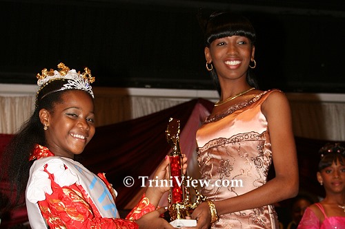 RIGHT: Sherrice Andrews receives award for 'Best Folk Dance'