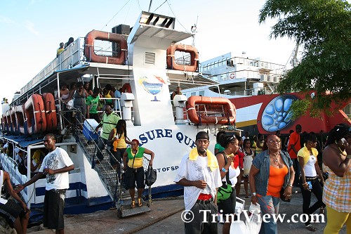 Passengers disembark the Treasure Queen at Pier 2 docks Chaguaramas