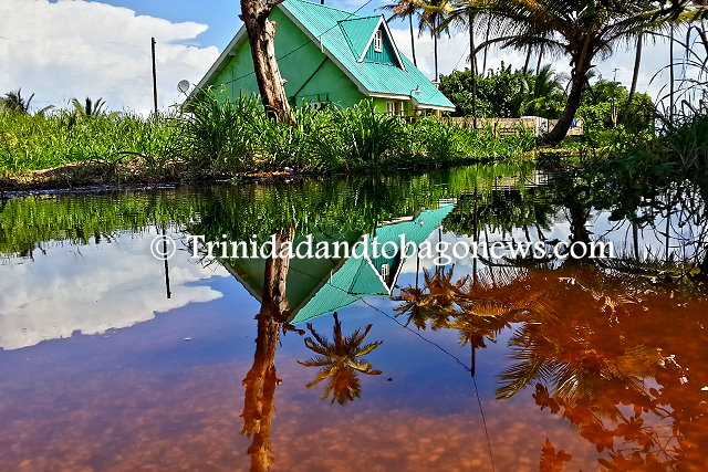 Flood waters along the Manzanilla Road, affecting properties and marooning residents in the area