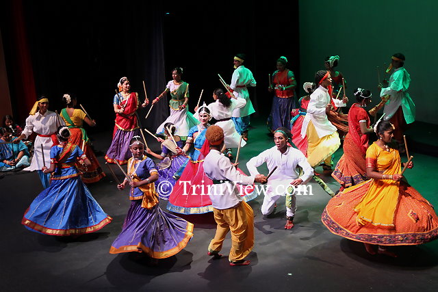 Dancers in colourful costumes celebrate the victory of good over evil and thank the Goddess by dancing the Dandia Rasa